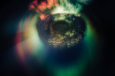 Parçacık alanı arka planı ile parlakgüzel soyut daire.