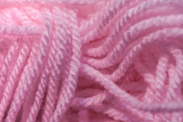 Close up beautiful tangle of pink thread  background texture. Macro Photography view.