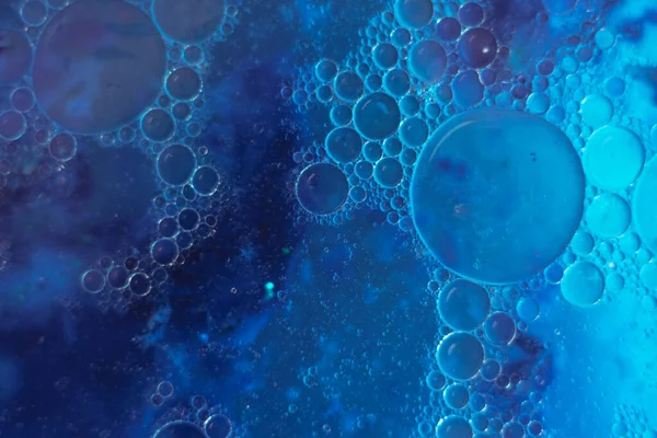 Beautiful abstract blue bubbles background pattern for design. Liquid fluid texture for background, banner.