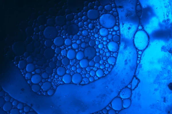 Beautiful abstraction phantom blue color light water. Background pattern for design. Macro photography view.