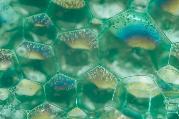 閉じる美しい緑の抽象的な石鹸の泡 デザインの背景パターン マクロ写真ビュー — ストック写真