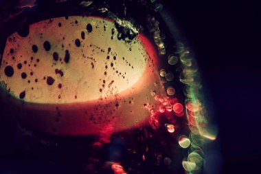 Beautiful RED and Orange colored bokeh on a dark abstract. Beautiful  background pattern for design.	