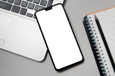 Not defteri, Masa üzerinde dizüstü ve cep telefonu