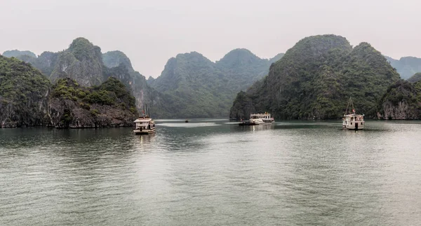 Boat cruising in Halong Bay, Vietnam. It is Unesco World Heritage Site and most visited place near Hanoi.