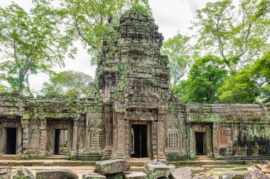 Ta tapınağın kalıntıları Prohm Angkor ağaçları ile büyümüş, Siem Reap, Kamboçya, geç 12 ve erken 13 centuries.it içinde inşa tarafından Khmer Kral Budist manastır ve üniversite olarak kuruldu. 