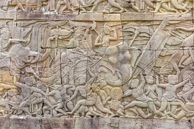 Duvar oymaları Bayon Tapınağı'nda. Angkor Kamboçya'da zengin bir şekilde dekore edilmiş Khmer tapınakta olduğunu. Geç duvar oymaları Bayon Tapınağı'nda inşa. Khmer Tapınağı'nda Angkor Kamboçya'da öyle. 12. yüzyılda resmî tapınak olarak Mahayana Bu, inşa