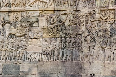 Duvar oymaları Bayon Tapınağı'nda. Angkor Kamboçya'da zengin bir şekilde dekore edilmiş Khmer tapınakta olduğunu. Geç duvar oymaları Bayon Tapınağı'nda inşa. Khmer Tapınağı'nda Angkor Kamboçya'da öyle. 12. yüzyılda resmî tapınak olarak Mahayana Bu, inşa