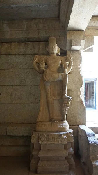 Interior (statues, columns, murals, sculptures) inside the Virupakshi temple complex - a Hindu temple dedicated to Shiva, located in Hampi, on the banks of the Tungabhadra River (the former capital of the Hindu empire Vijayanagara), Karnataka, India.