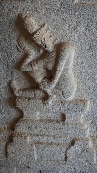 Interior (statues, columns, murals, sculptures) inside the Virupakshi temple complex - a Hindu temple dedicated to Shiva, located in Hampi, on the banks of the Tungabhadra River (the former capital of the Hindu empire Vijayanagara), Karnataka, India.