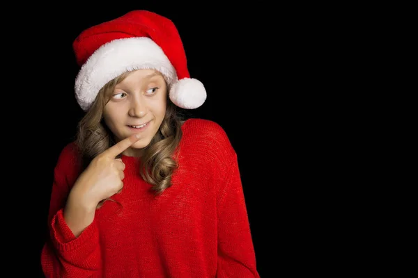 Menina Animada Camisola Vermelha Chapéu Papai Noel Olha Para Lado — Fotografia de Stock