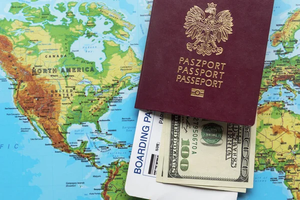 Polish biometric passport on the background of the World map. The concept of visa-free travel.