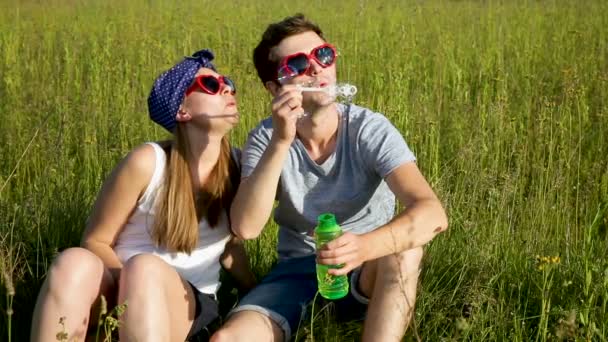 Couple Love Blowing Soap Bubbles Laughs — Stock Video