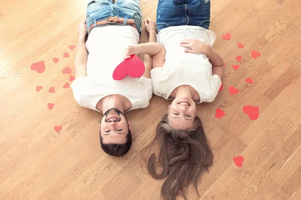 Pareja Cariñosa Con Corazones Rojos —  Fotos de Stock