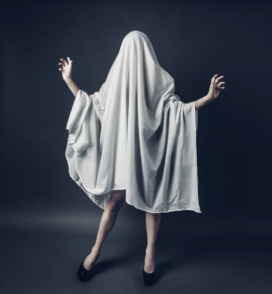 Sexy Girl with long legs in costume Spooky white ghost. Halloween minimal concept — Φωτογραφία Αρχείου