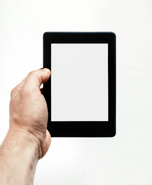 Man hand holds e-book on white background. Modern technology for knowledge concept — Stock Photo, Image