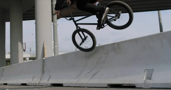 Extreme bmx cyclist doing bike tricks