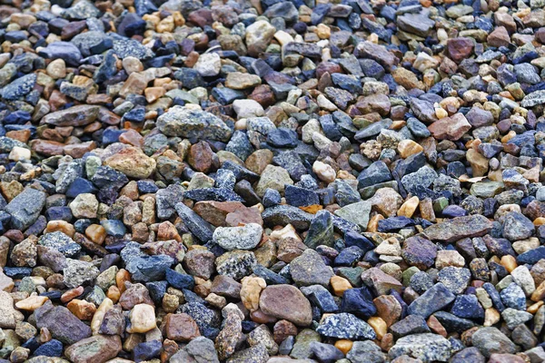 Crushed stones texture background. Stones construction rocks.