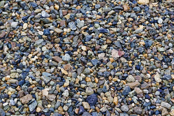 Crushed stones texture background. Stones construction rocks.