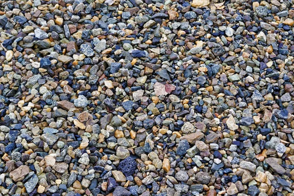 Crushed stones texture background. Stones construction rocks.