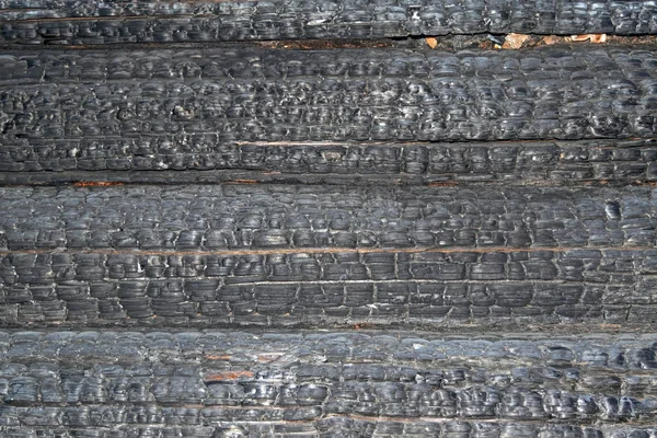 Konsistens Förkolnade Stockar Bränt Trä Förkolnade Log House Textur Närbild — Stockfoto
