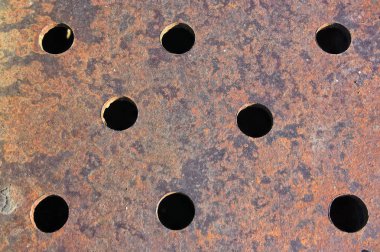 Bir paslı metal levha delik yakın çekim ile doku