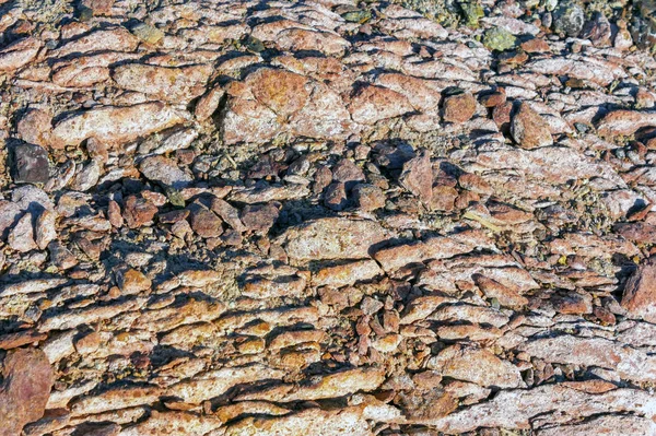 Pared de piedra marrón textura de roca fondo primer plano . — Foto de Stock