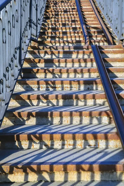 Cast iron wrought iron stairs in the city park. — Stock Photo, Image