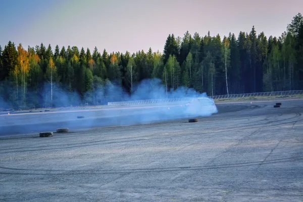 Car drifting. Sports car in the drifting competition.