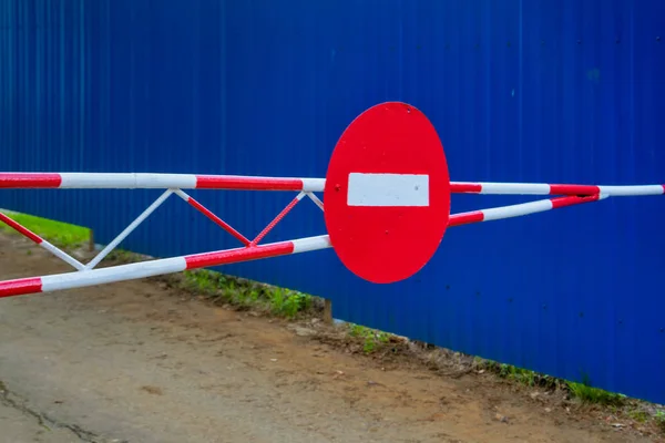 Close up Barrier Gate. Barrier with road signs. Do not enter.