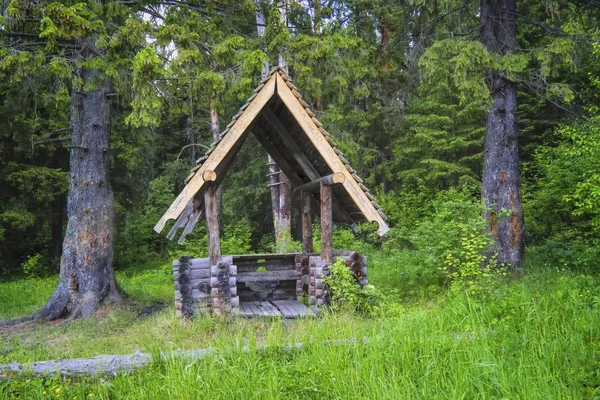 Log gazebo in the forest. — Stock Photo, Image