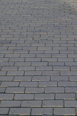 Soyut gri asfalt döşeme dokusu arka planı. Yakın plan. Paving levhaları yakın plan.