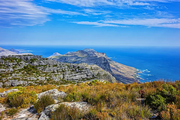 At top of Table Mountain. Table Mountain is the most iconic landmark of South Africa, overlooking the city of Cape Town. Cape Town South Africa.