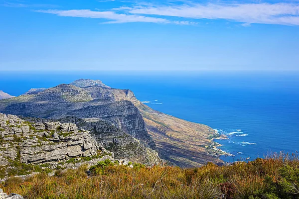 At top of Table Mountain. Table Mountain is the most iconic landmark of South Africa, overlooking the city of Cape Town. Cape Town South Africa.