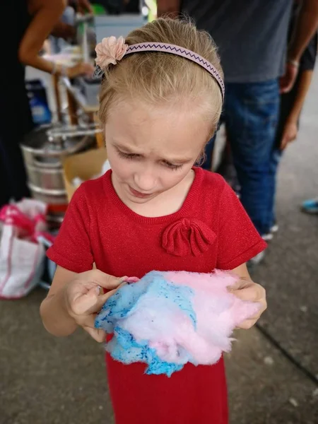 Cute Girl Eating Cotton Candy — Stock Photo, Image