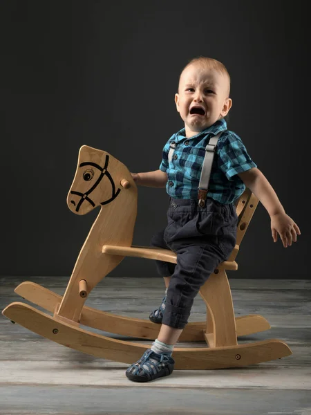 Sweet Little Boy Playing Home Wooden Horse Childhood Games — Stock Photo, Image