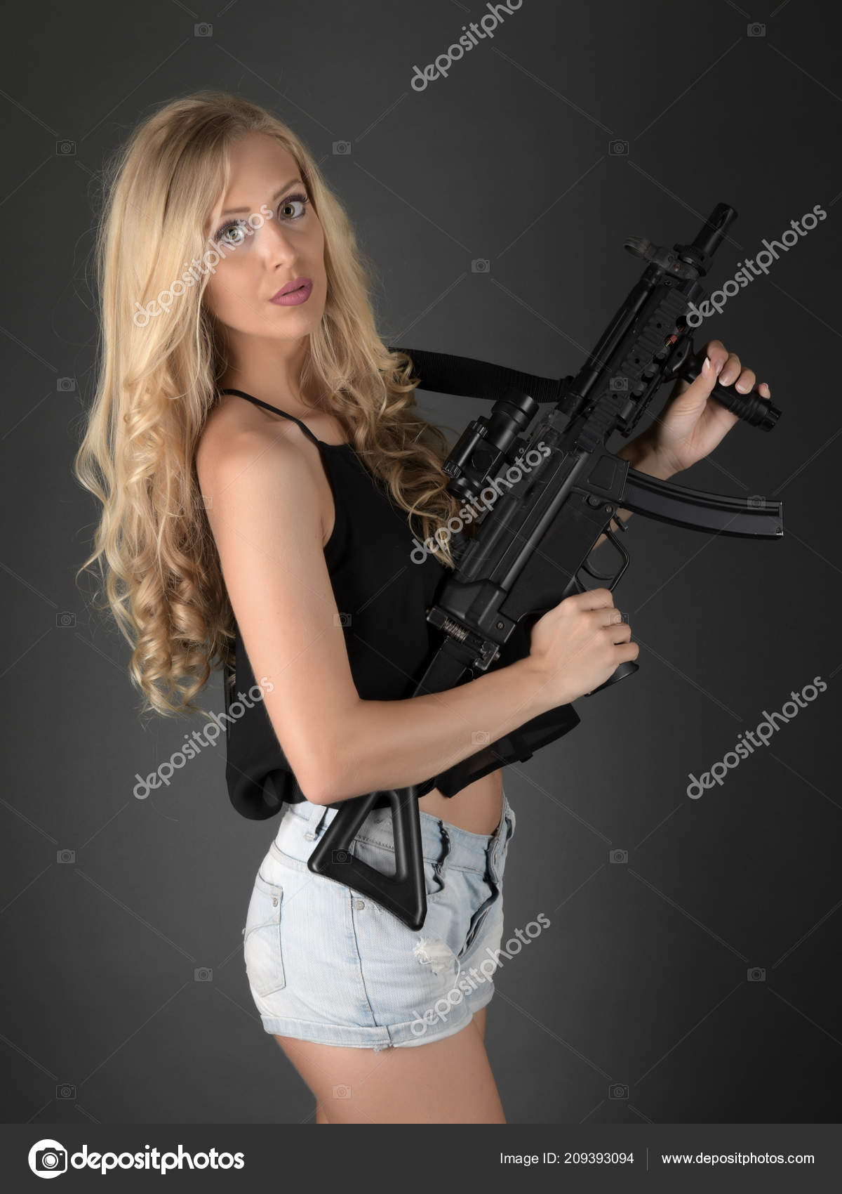 Female Assassin Gun Stock Photo by ©muro 209393094