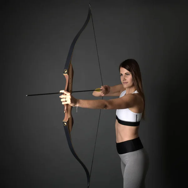 Attractive Female Practicing Archery