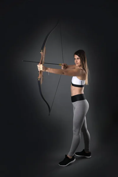 Attractive Female Practicing Archery
