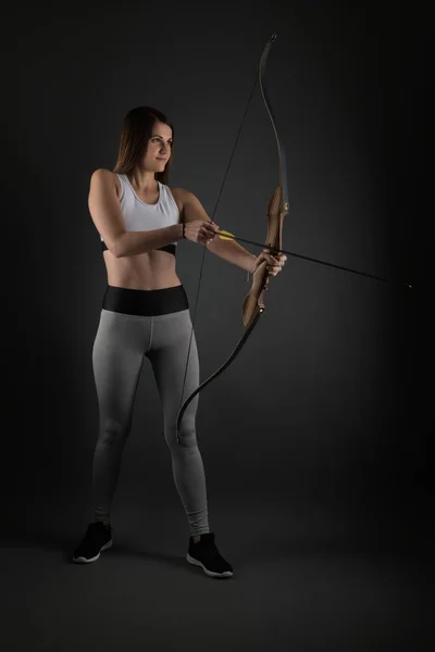 Attractive Female Practicing Archery