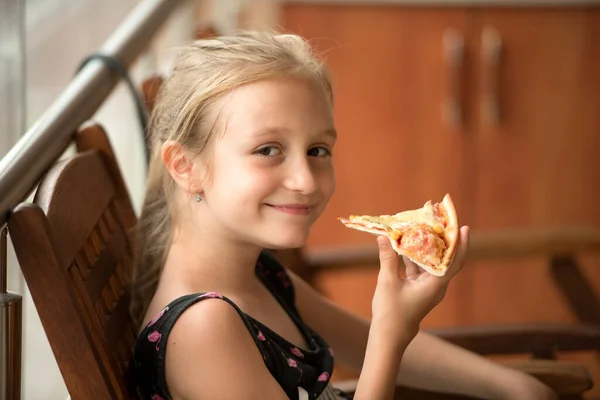 Young Girl Eating Piece Pizza — Stockfoto