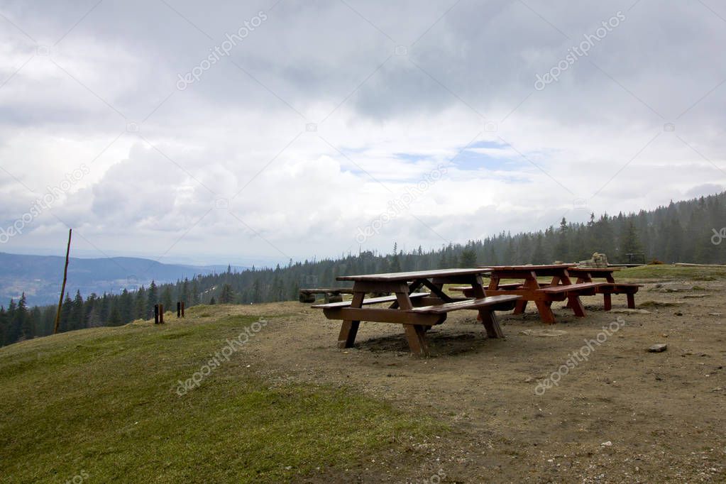 View to the bench on trail in Karkonosze. Poland