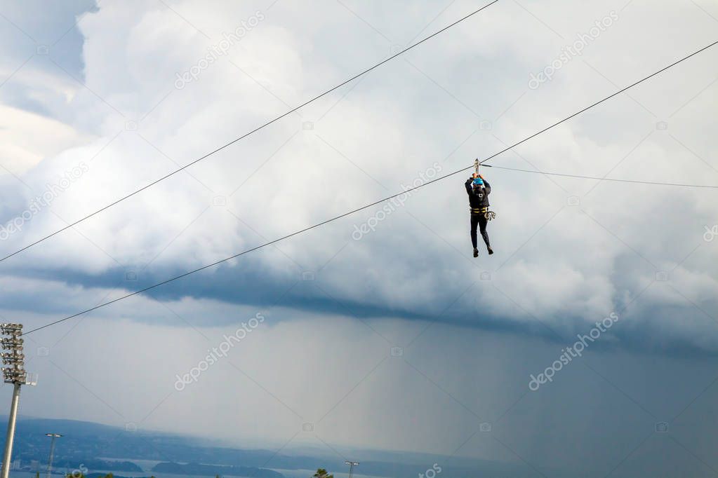 Ziplining on a zip wire in Oslo from top of Holmenkollen ski jump
