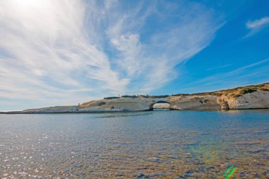 Limestone rock with arch, S`Archittu di Santa Caterina in Oristano Province, Sardinia, Italy clipart