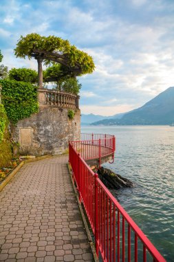 holidays in Italy - a view of the most  beautiful lake in Italy, Varenna, Lago di Como. Evening time. clipart