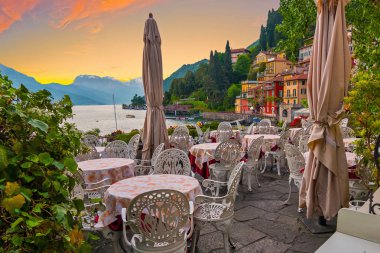 holidays in Italy - a view of the most  beautiful lake in Italy, Varenna, Lago di Como. Evening time. clipart