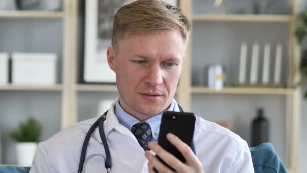 Doctor Browsing Internet Smart Phone — Stock Video