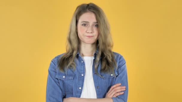 Young Pretty Girl Shaking Head Reject Yellow Background — Stock Video