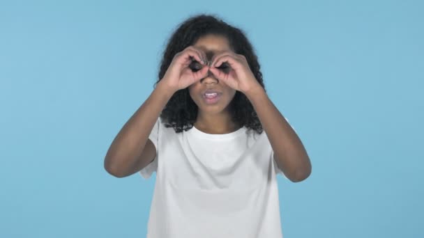 African Girl Searching Handmade Binoculars Isolated Blue Background — Stock Video