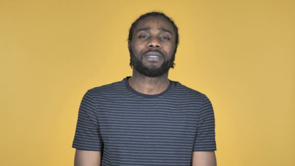 Sad Upset Casual African Man Isolated Yellow Background — Stock Video