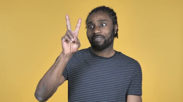 Victory Sign Casual African Man Isolated Yellow Background — Stock Video